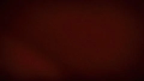 Dark red grainy blurred background with deep brown gradient and 4K tech abs.. 스톡 사진