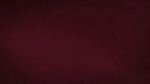 Dark red grainy textured background with subtle burgundy gradient 4K resolu.. Stock Photos