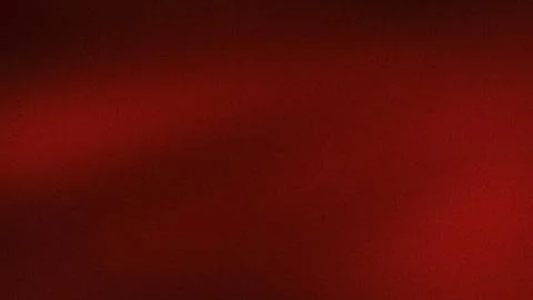 Dark red grainy textured gradient background wallpaper with abstract blur a.. Stock Photos