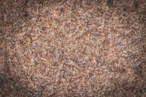Dark red granite background, structured background with vignetting, darkening Stock Photos