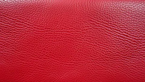 Dark red leather background texture closeup Stock Photos