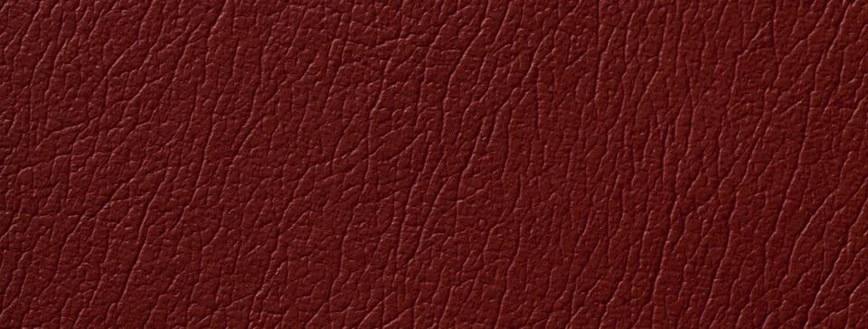 Dark red leather texture background with fine grain, macro surface. Wine upho Illustrazione stock