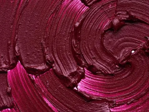 Dark red makeup smear of matte lip gloss Stock Photos