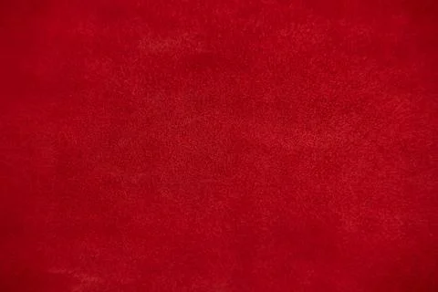 Dark red matte background of suede fabric, closeup. Velvet texture of seamles 写真素材