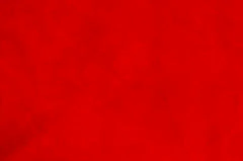 Dark red matte background of suede fabric, closeup. Velvet texture of seamles 스톡 사진