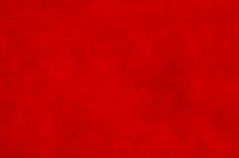 Dark red matte background of suede fabric, closeup. Velvet texture of seamles 写真素材