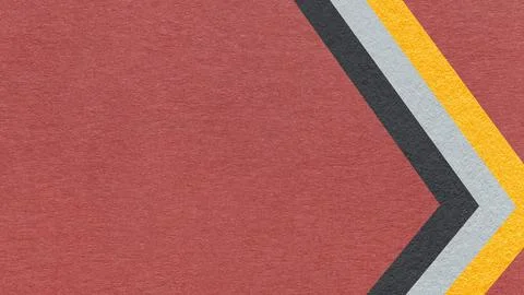 Dark red paper texture background with yellow black chevron stripes and cop.. Stock Photos