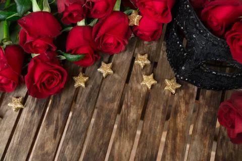Dark red roses on table Stock Photos