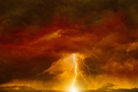 Dark red sky with lightning Фото