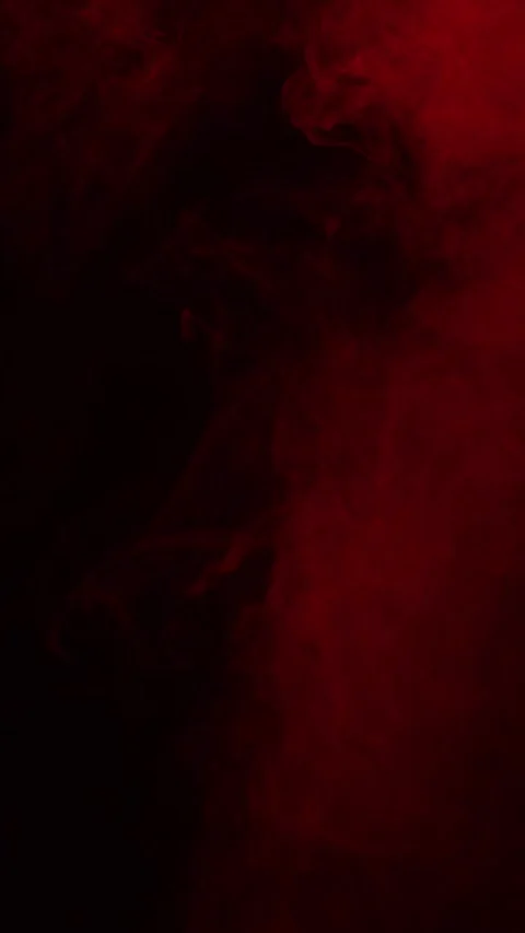 Dark red smoke creating an atmospheric texture, vertical format Stock Footage 340131062