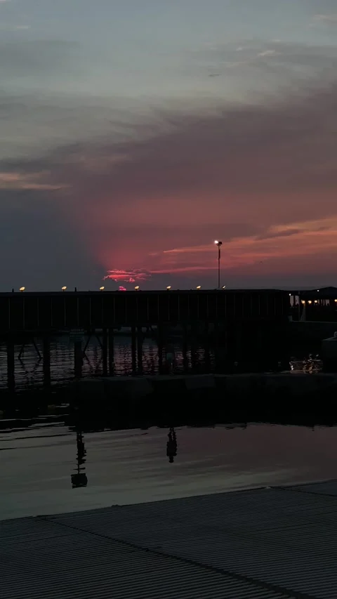 Dark Red Sunset over the sea in Livorno, Italy Stock Footage 201823955
