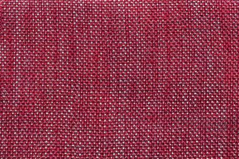 Dark red textile background with checkered pattern, closeup. Structure of the Stock Photos