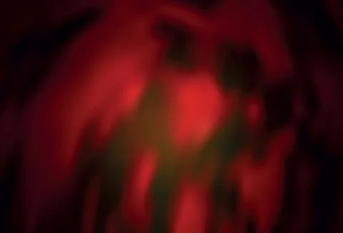 Dark Red vector blurred pattern. Stock Illustration