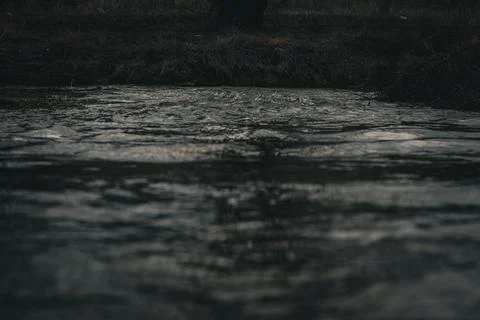 Dark River Flowing Stock Photos