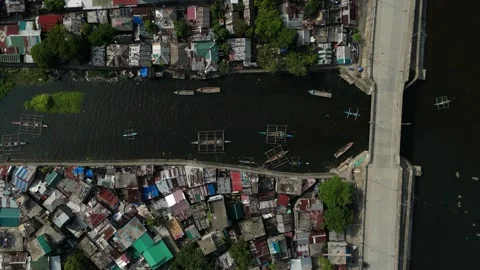 Dark river flows beneath a concrete bridge. Stock Footage 335588423