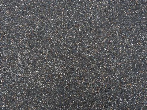 Dark road surface with grainy texture. Fullscreen photos. Not seamless texture Foto stock