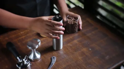 Dark roasted bean poured by home barist Stock Footage 203770633