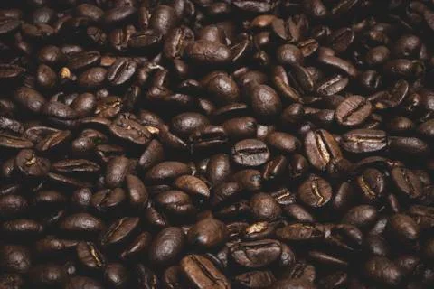 Dark Roasted Coffee Beans for Backgrounds Stock Photos