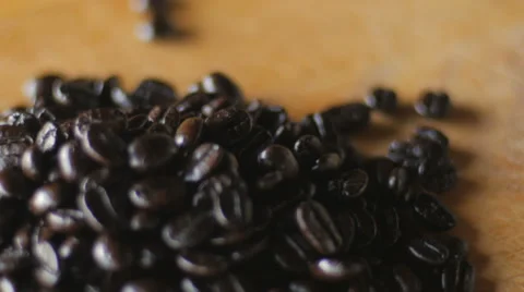 Dark roasted coffee beans close up and dolly shot Stock Footage 63209607