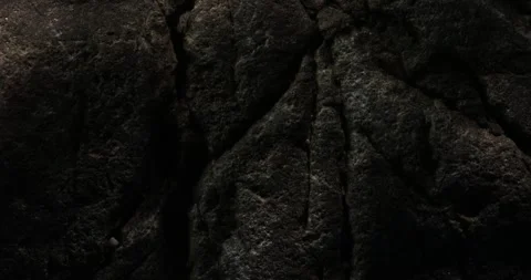 Dark Rock Surface with Deep Cracks and Textures Stock Footage 293007377