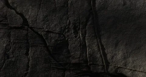Dark Rock Surface with Linear Cracks and Textures. Stock Footage 275256543