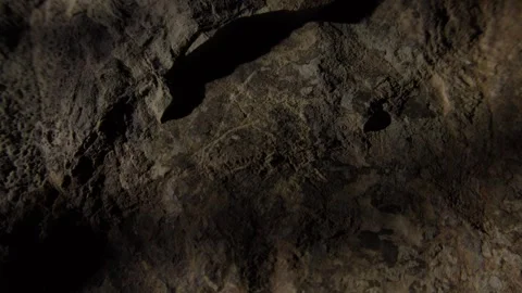 Dark Rock Surface with Shadowed Crevice Stock Footage 287877092
