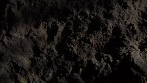 Dark Rocky Surface Close-Up in dramatic light Stock Footage 287877200