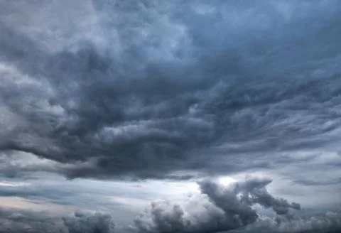 Dark rolling clouds Stock Photos