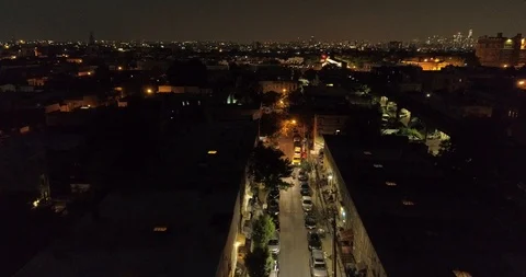 Dark rooftops with the distant Manhattan skyline from Ridgewood Stock-Footage 92960185