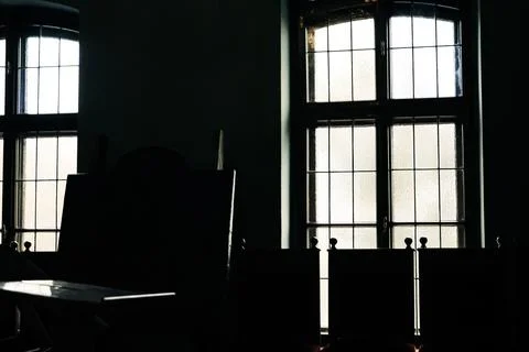Dark room with bright windows and shadows Stock Photos