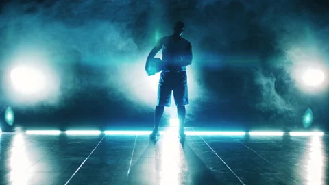 Dark room with clouds of smoke and a basketball player Stock Footage 149503516
