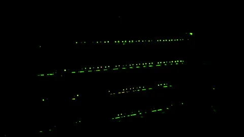 Dark room with computer network lights flashing Stock Footage 140799153