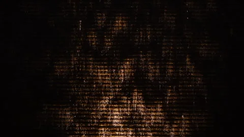 A dark room is illuminated by light through a window, suggesting discovery Stock Footage 308929503