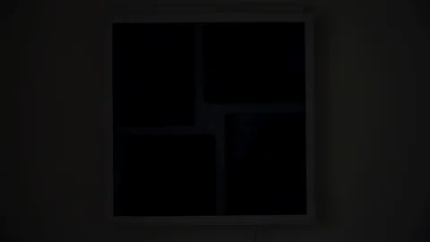 A dark room lights up the x-ray lamp pictures. the x-ray images show the chest Stock Footage 91667358