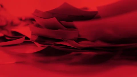 A dark room. Red light. close-up. 4k. photo. a stack of finished printed photos Stock Footage 234707409