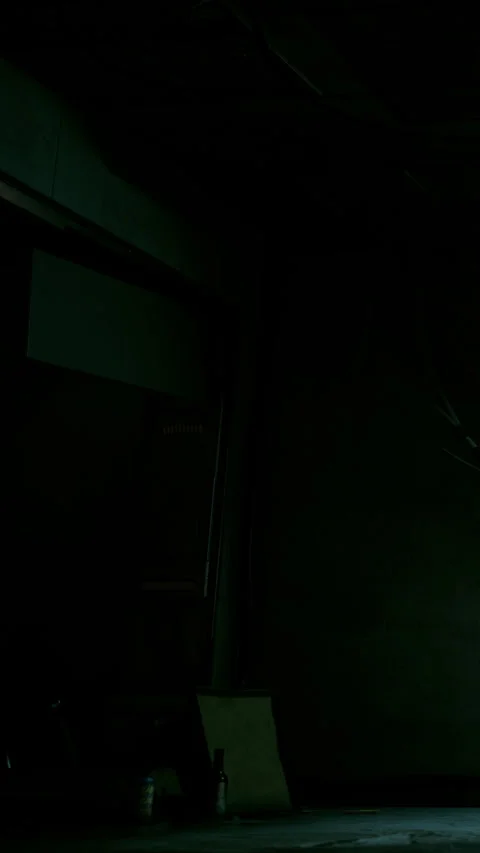 Dark room with shadows and dim light creating a mysterious atmosphere Stock Footage 335692620