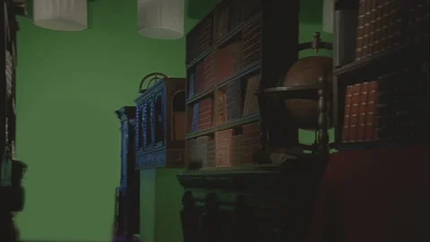 In the dark room there is a library with many books placed on different cabinets Stock Footage 119640099