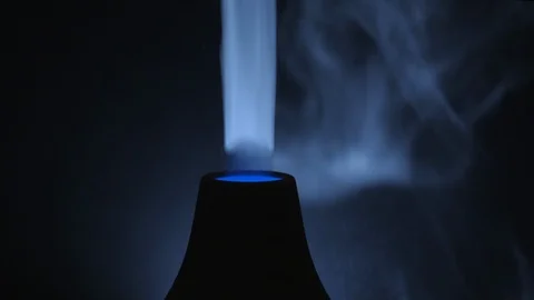 A Dark Room With A Turned On Ultrasonic Diffuser Releasing White Smoky Stock Footage 123167801