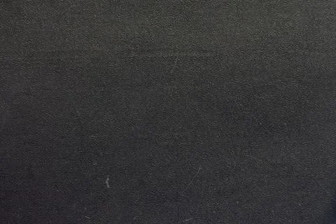 Dark rough background with small cracks and scratches Stock Photos