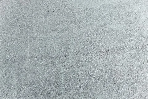 Dark rough lime plaster wall Stock Photos