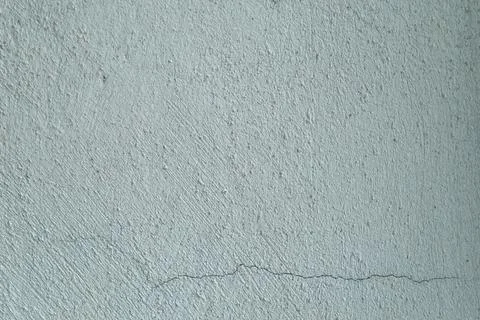 Dark rough lime plaster wall Stock Photos
