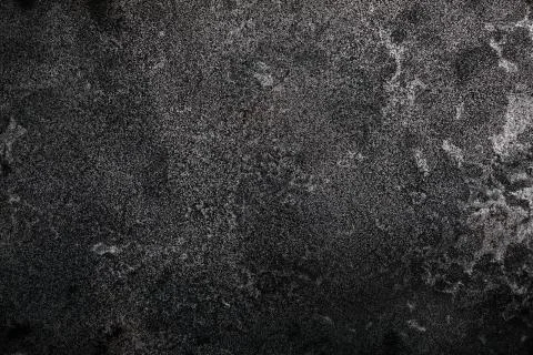 Dark rough metal texture background Stock Photos