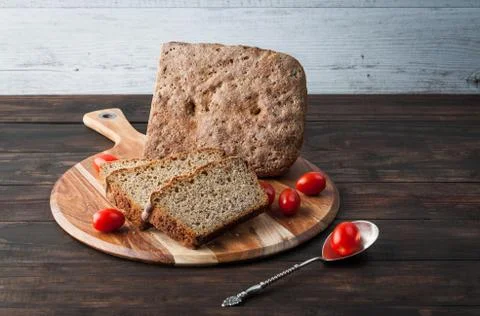 Dark rye tomato bread Stock Photos