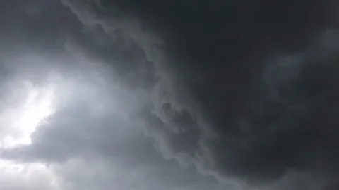 Dark scary rolling clouds with lightning flashes. A stormy morning in 스톡 동영상 121317474