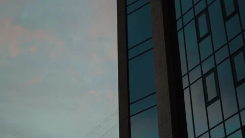 Dark scene, edge of the modern hightower with cloudy sky on background Video stock 212674921