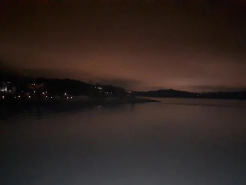 In the dark by the sea Stock Photos