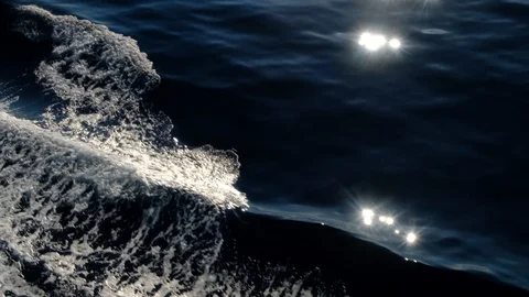 Dark Sea with Waves and Reflected Sun Stock Footage 123412807