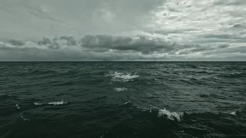 Dark Sea Waves Under Dramatic Cloudy Sky with Stormy Atmosphere Stock Footage 311320011