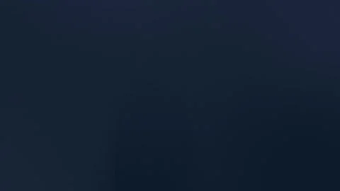 Dark seamless loop background with smooth gradient navy blue and subtle grain Stock Footage 299397178