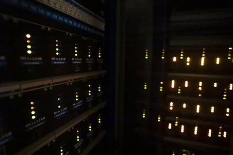 Dark server room with LED lights.  Central computer technology room of a sm.. Stock Photos